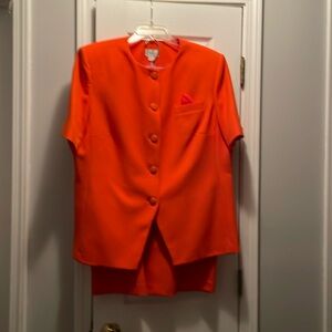 The orange suit in a size 16W will look great for any event.